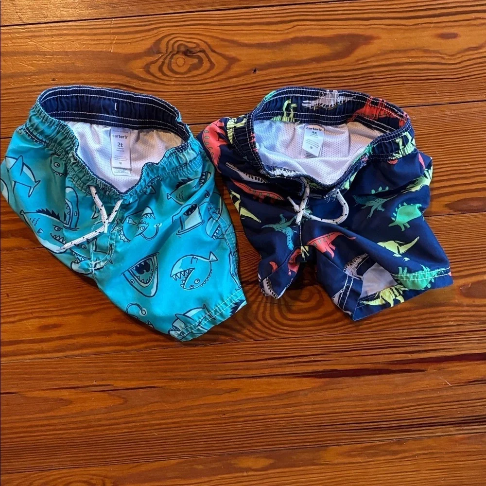 2 Boys Carter’s Swim Shorts/Trunks 1 Dinosaur Print 1 Shark Print Size 2T